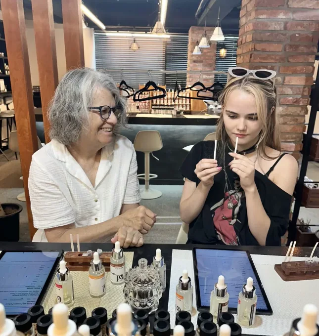 Two family members enjoying a perfume workshop together in Hongdae Seoul